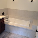 "Gray Shadow" Marble flooring with Silstone bath counter top and wall spash..